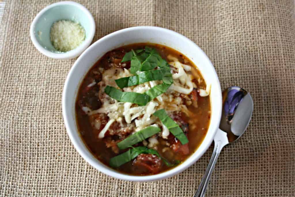 healthy lasagna soup in a white bowl