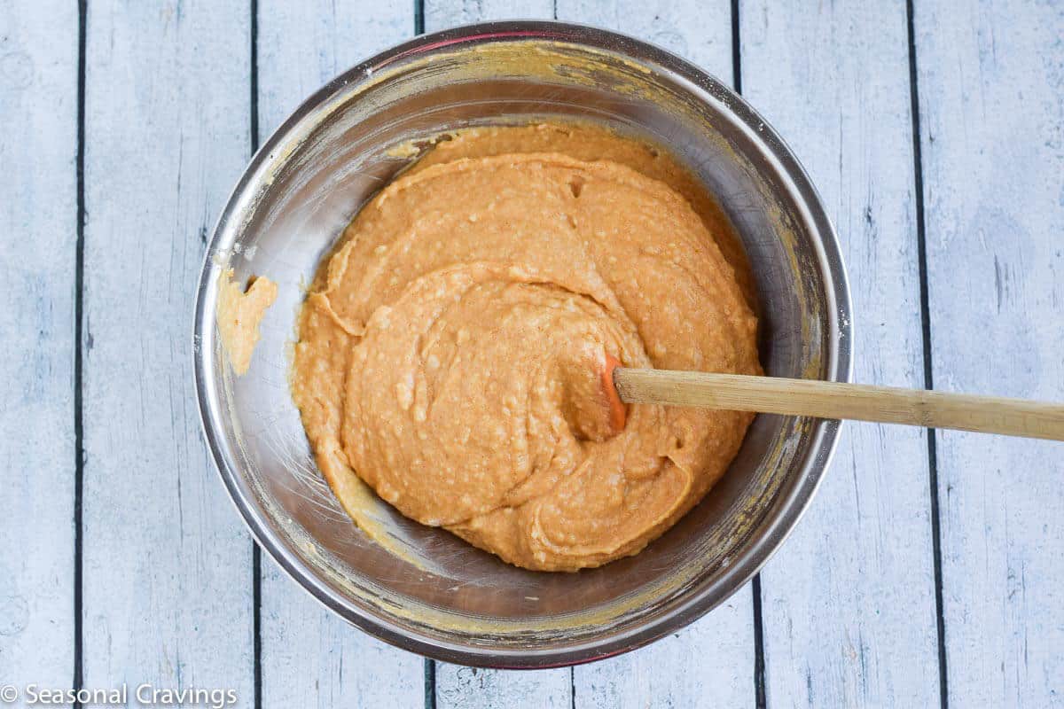 Easy Gluten Free Pumpkin Doughnuts batter in a silver bowl