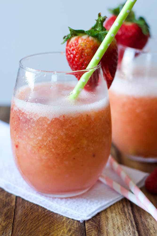 Frozen Sangria with strawberries and a straw