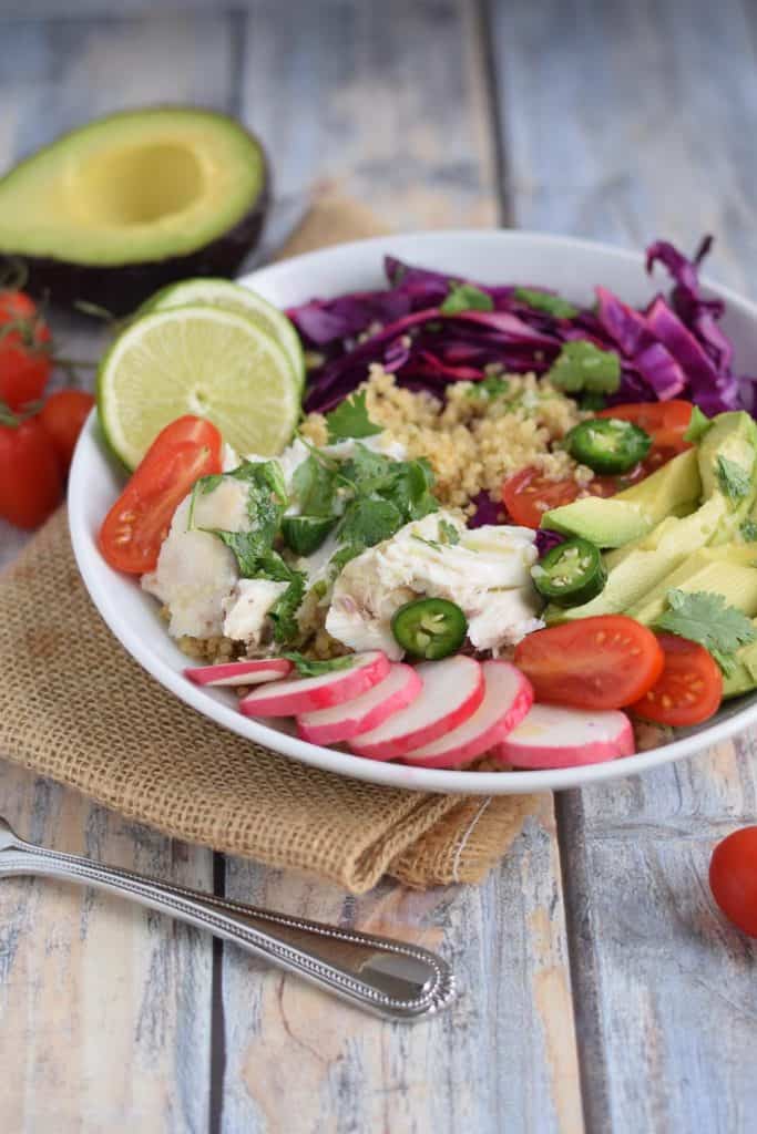 Fish Taco Grain Bowl in white bowl on burlap