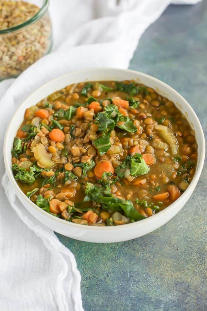 lentil kale Soup instant pot in a white bowl