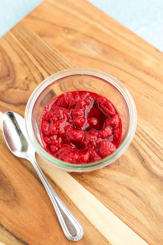 Gluten Free Baked Vanilla Donuts with raspberries in a jar