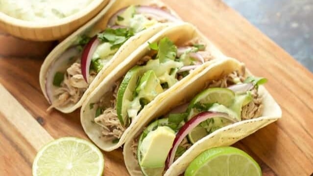 Instant Pot Pork Tacos with avocado and onion