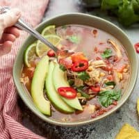 Easy Instant Pot Chicken Tortilla Soup is loaded with corn, chicken and beans. #glutenfree