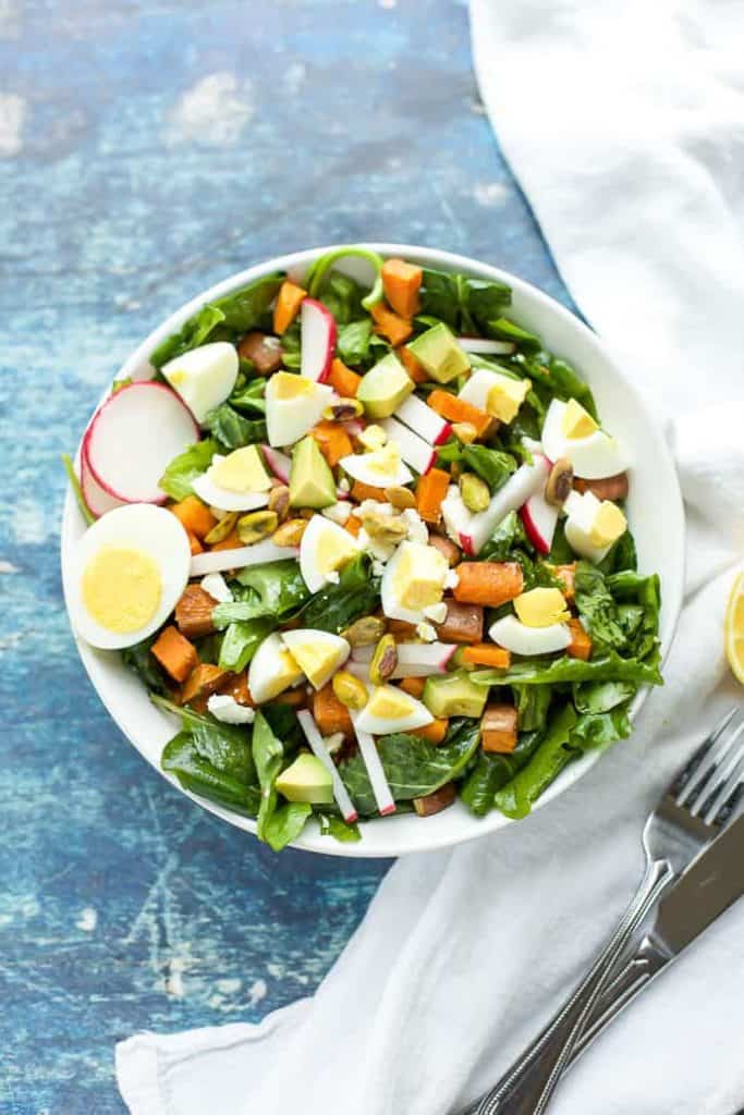 Spiced Sweet Potato and Kale Salad in a white bowl