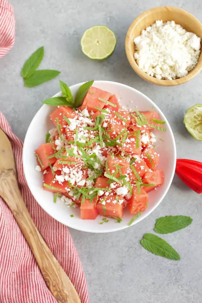  watermelon salad in a white bowl