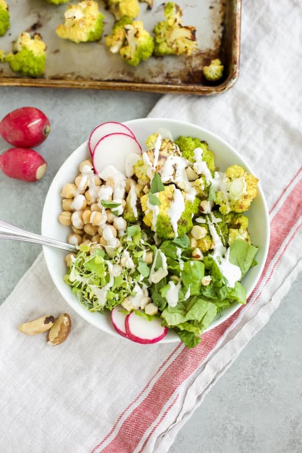 roasted cauliflower bowl in a white bowl