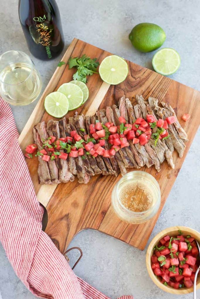 Grilled Skirt Steak with Watermelon Salsa and limes