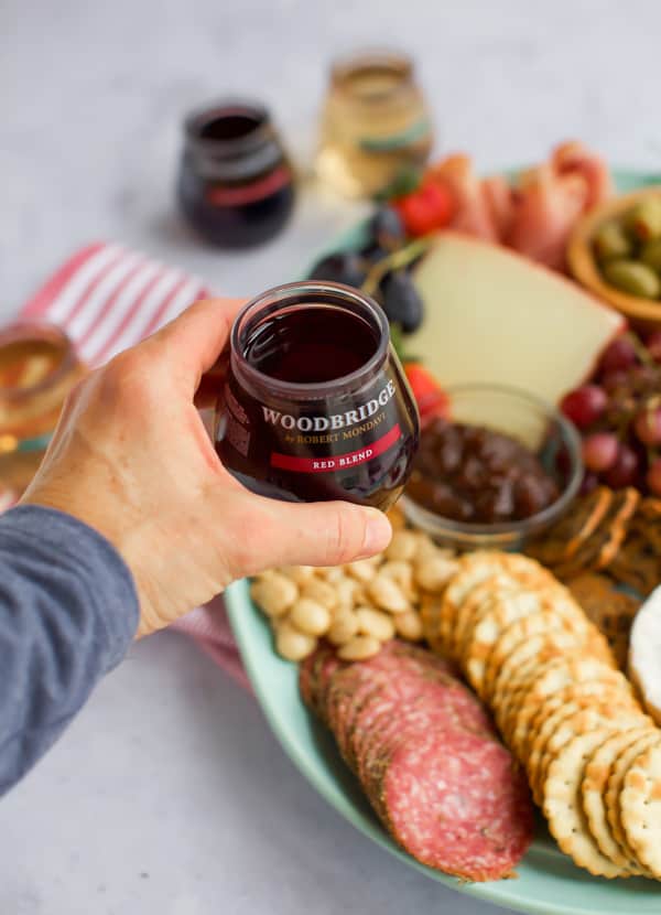 cheese tray appetizer with wine