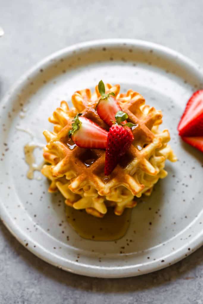 gluten free waffles with strawberries overhead shot