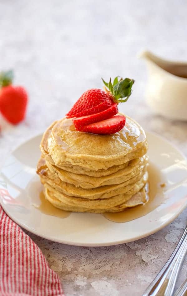 gluten free pancakes on a white plate