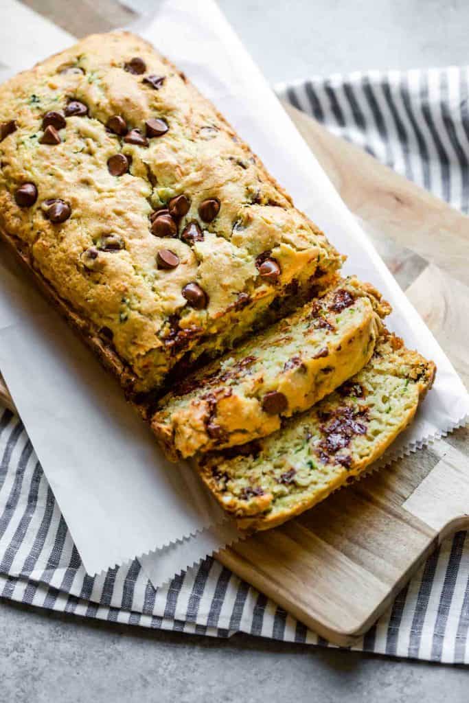 gluten free zucchini bread on a cutting board with slices