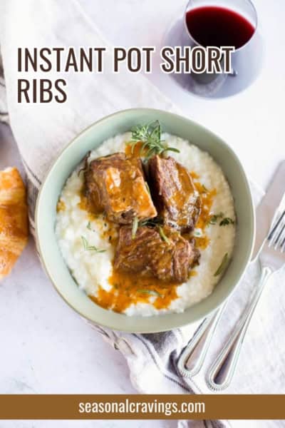 A bowl of Instant Pot short ribs served over mashed potatoes, garnished with herbs. A glass of red wine, a piece of bread, and cutlery are placed beside the bowl. Text reads: "The ultimate comfort meal—Instant Pot short ribs.