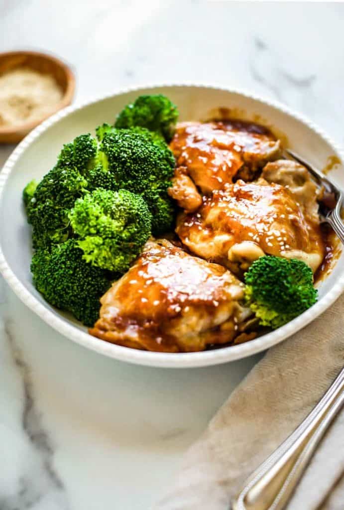 instant pot chicken teriyaki in a white bowl with broccoli