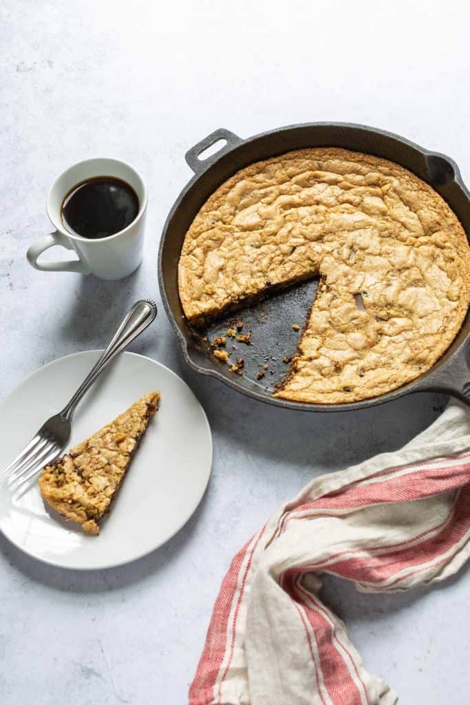 gluten free chocolate chip skillet cookie in a cast iron pan