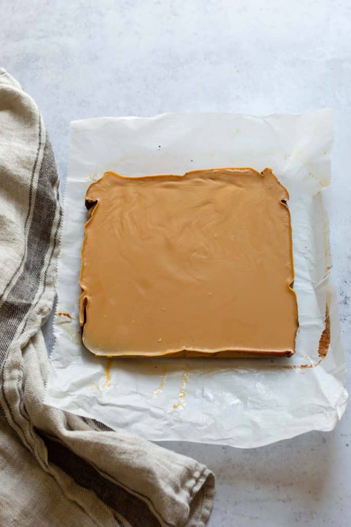 chocolate peanut butter fudge before it is sliced