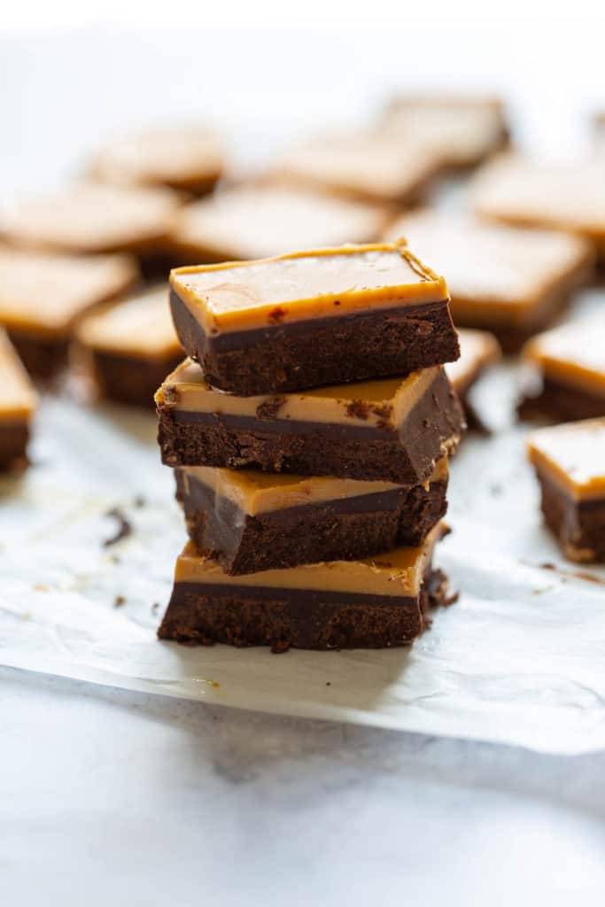 four pieces of chocolate fudge stacked up