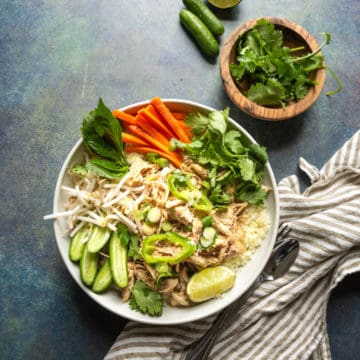 five spice chicken bowl with carrots and cucumbers