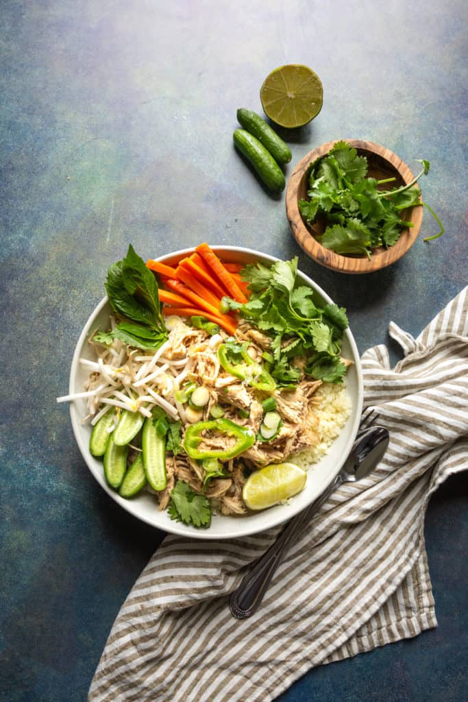 five spice chicken bowl with carrots and cucumbers