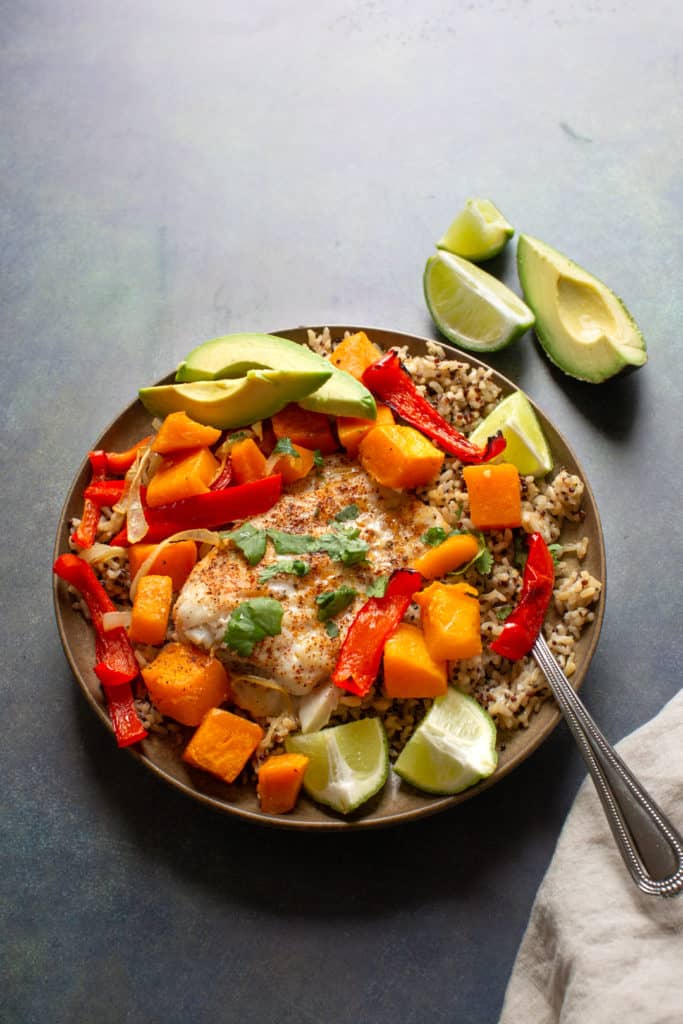 bowl of rice with baked cod and butternut squash