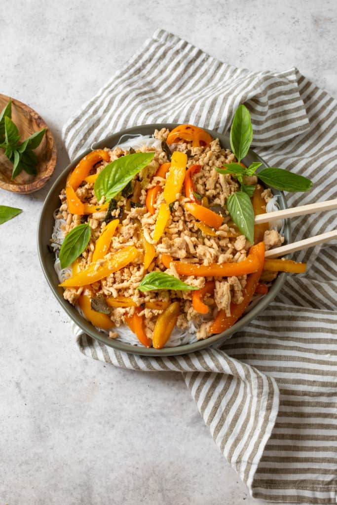 thai basil chicken with chopsticks