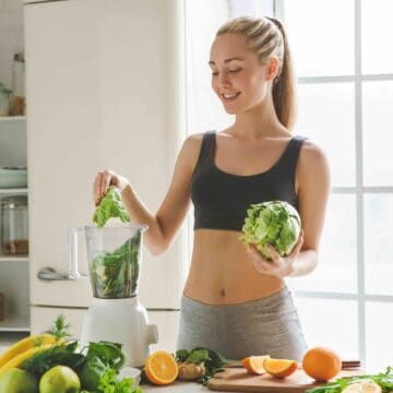 woman with a green smoothie