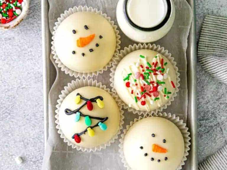 Christmas hot chocolate bombs with colorful toppings.