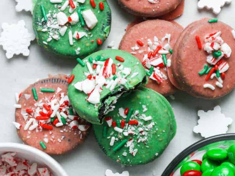 Colorful Christmas oreo's with M&M candies and candy canes.