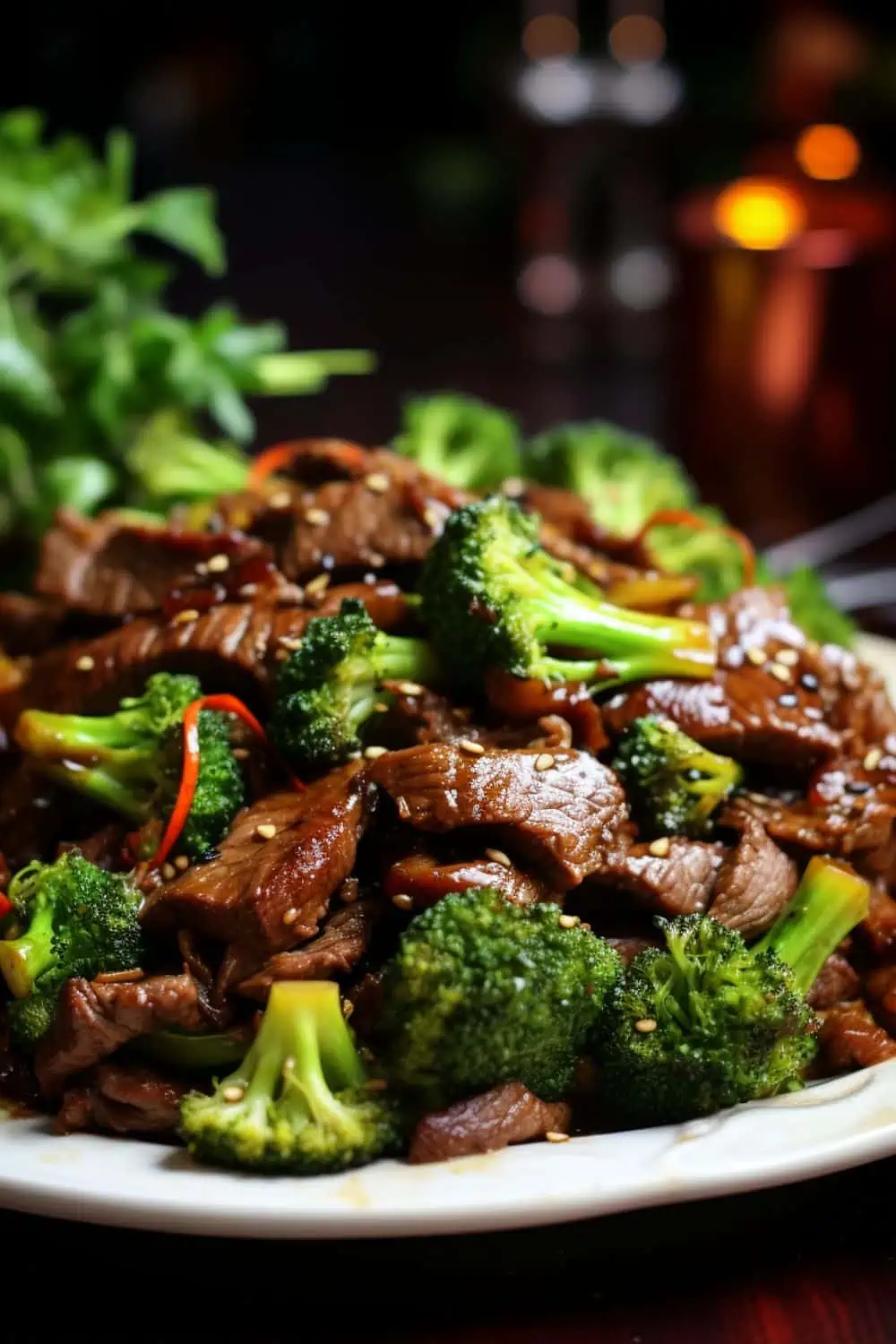 Freshly cooked keto beef and broccoli stir-fry, combining vibrant broccoli and juicy beef slices. 
