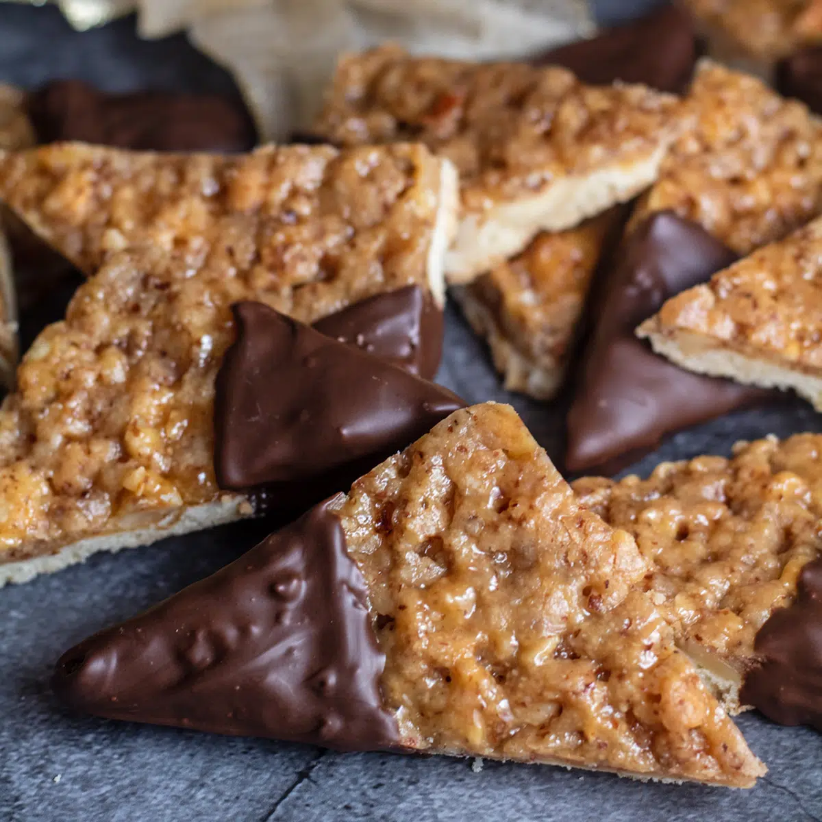 A plate of unique chocolate covered graham crackers.