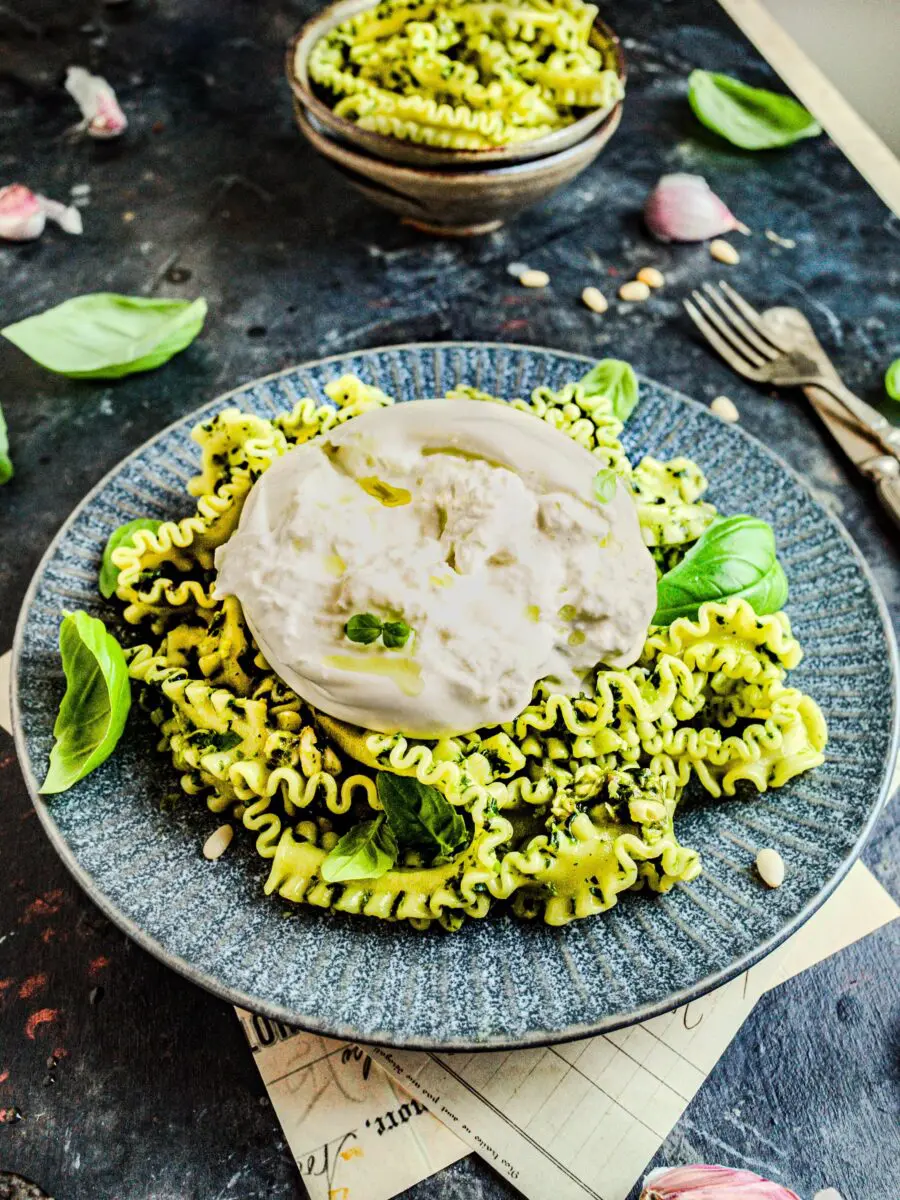 Watercress pesto pasta with mafaldine noodles and burrata. 
