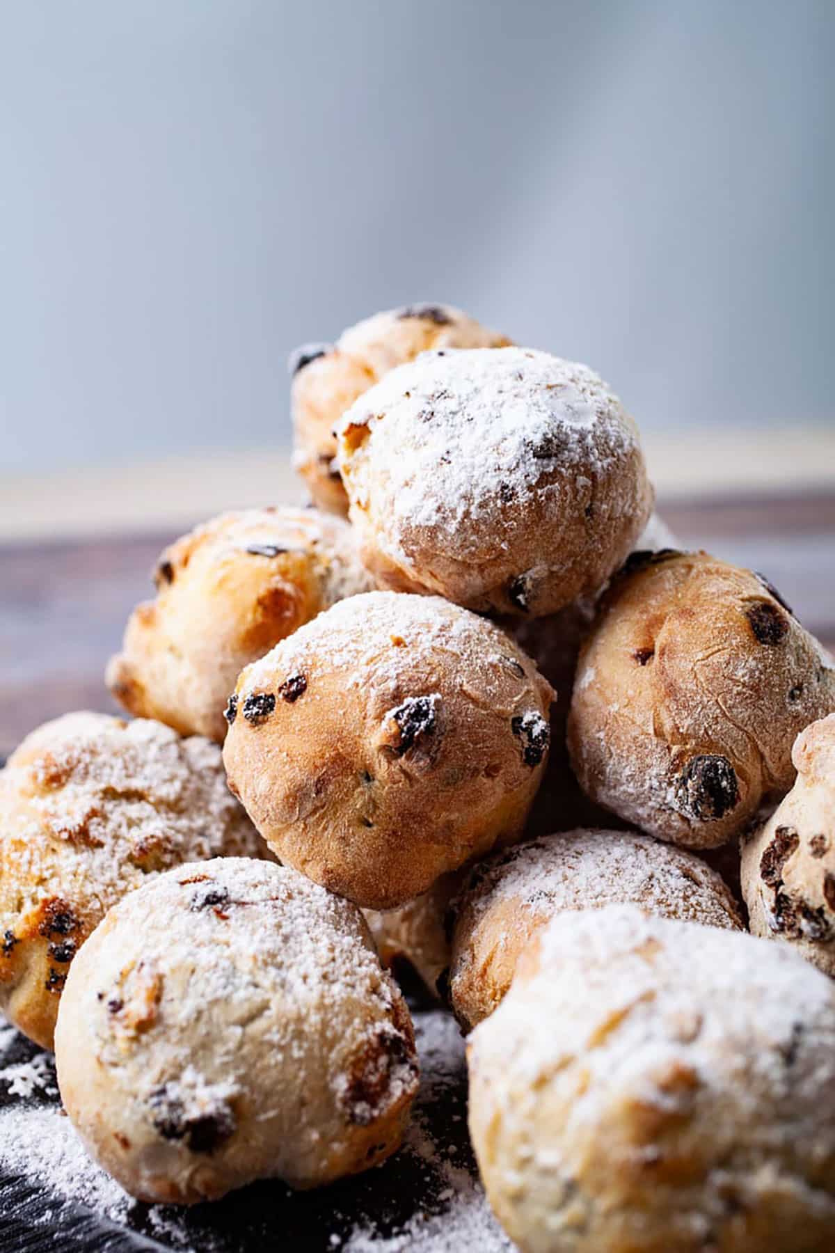 A delectable stack of cookies, delicately dusted with powdered sugar.