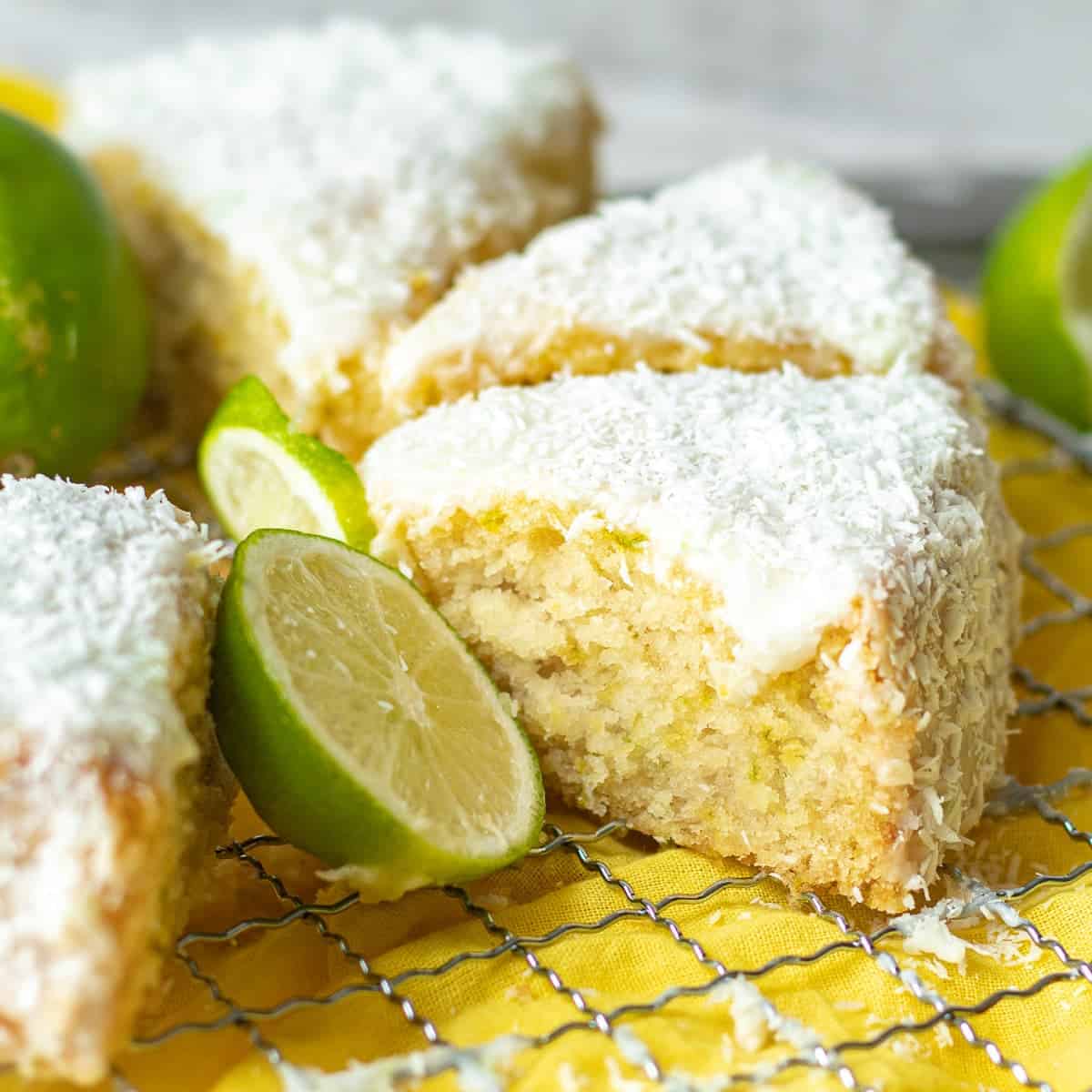 slices of vegan coconut cake on a tray.