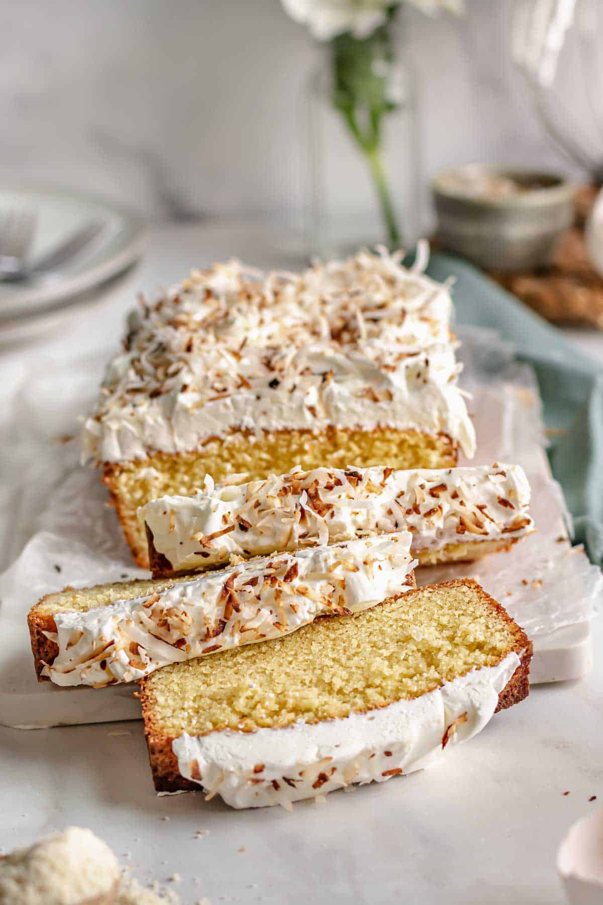 Loaf cake partially sliced.