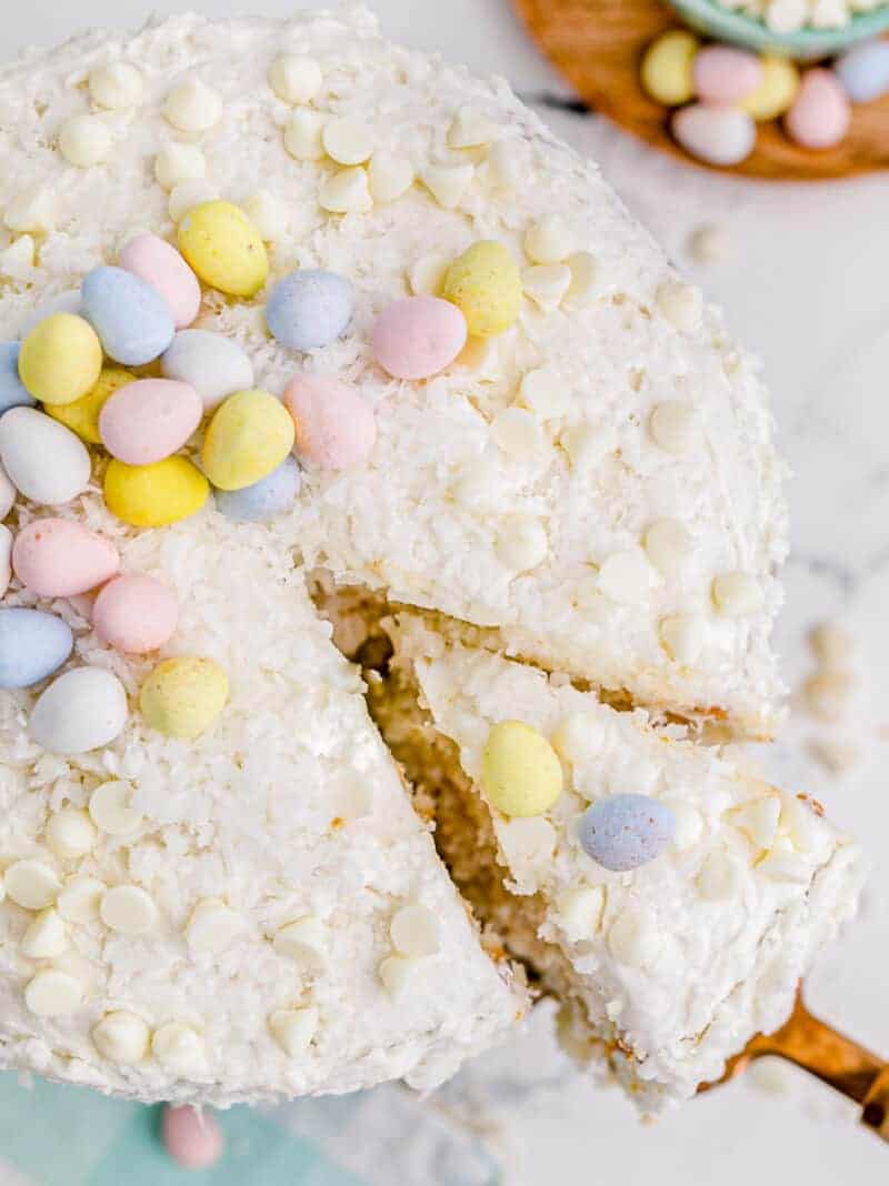 overhead white chocolate coconut easter cake.
